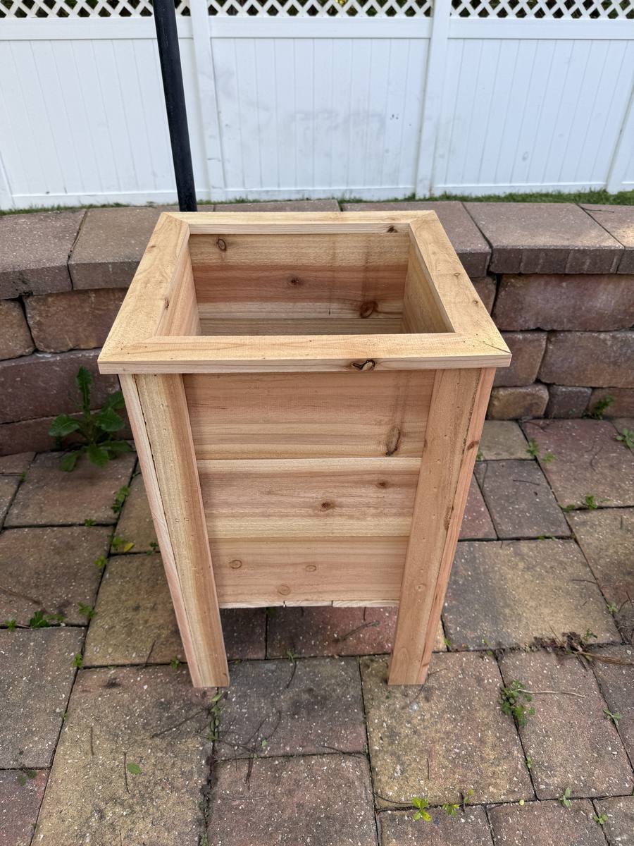 Large tall cedar square planter box showing natural cedar grain — approximately 16x16 inches