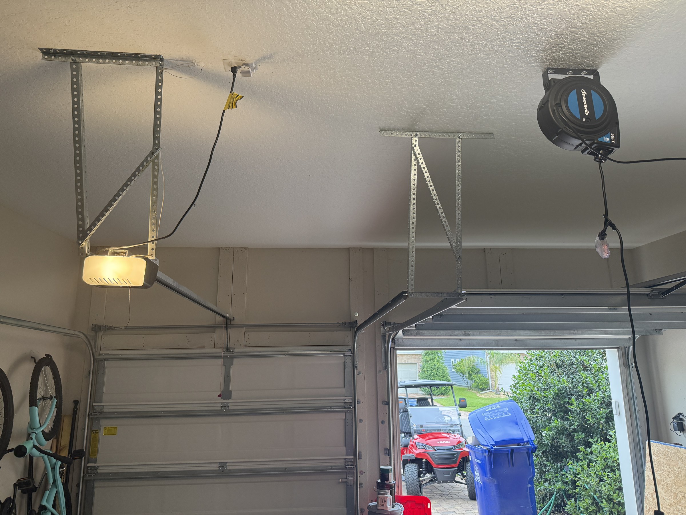 Garage ceiling with brackets installed but no rack yet