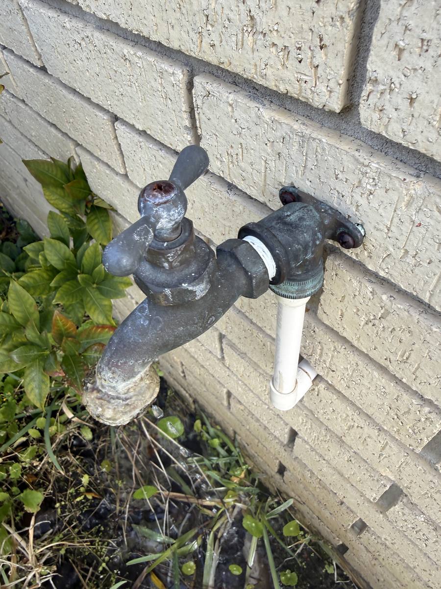 Old damaged hose bib before replacement