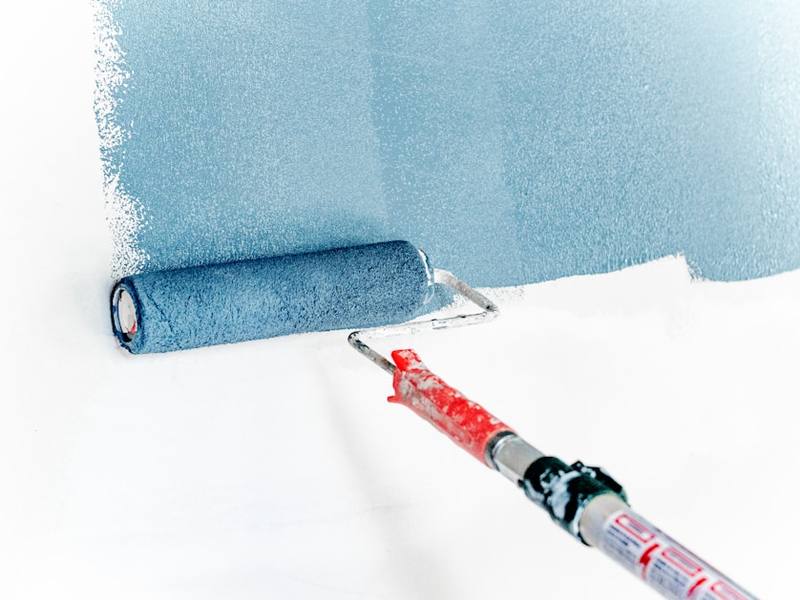 Paint brush close-up — drywall and painting services